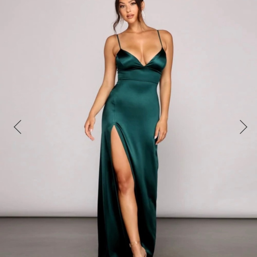 Brand new Windsor formal gown. New with tags on and still in original packaging.